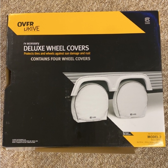 Deluxe wheel covers for travel trailer.